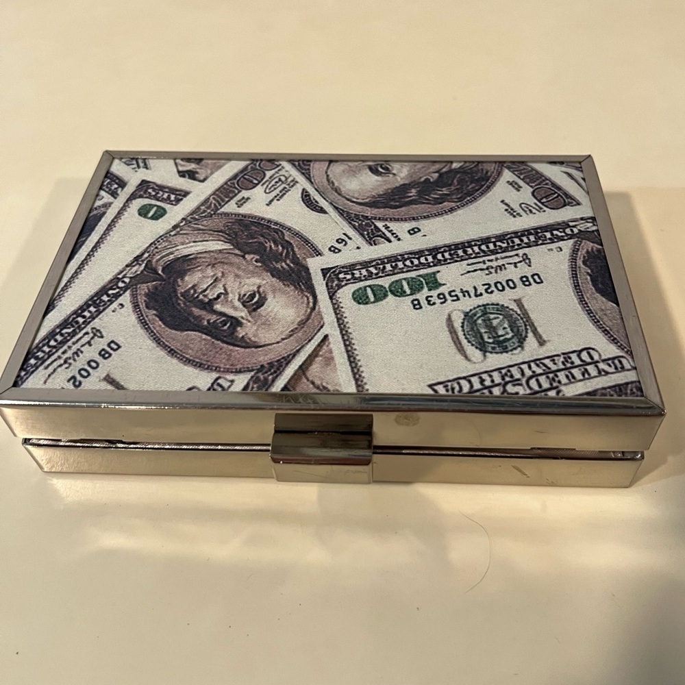 PrettyLittleThing Silver Metallic Clutch 100 dollar bill Benjamin printed
